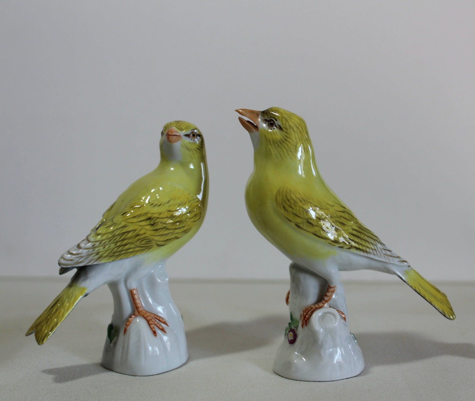 PAIR MEISSEN YELLOW PORCELAIN BIRDS: Pair of antique small Meissen parcelain yellow birds. H 4 in.