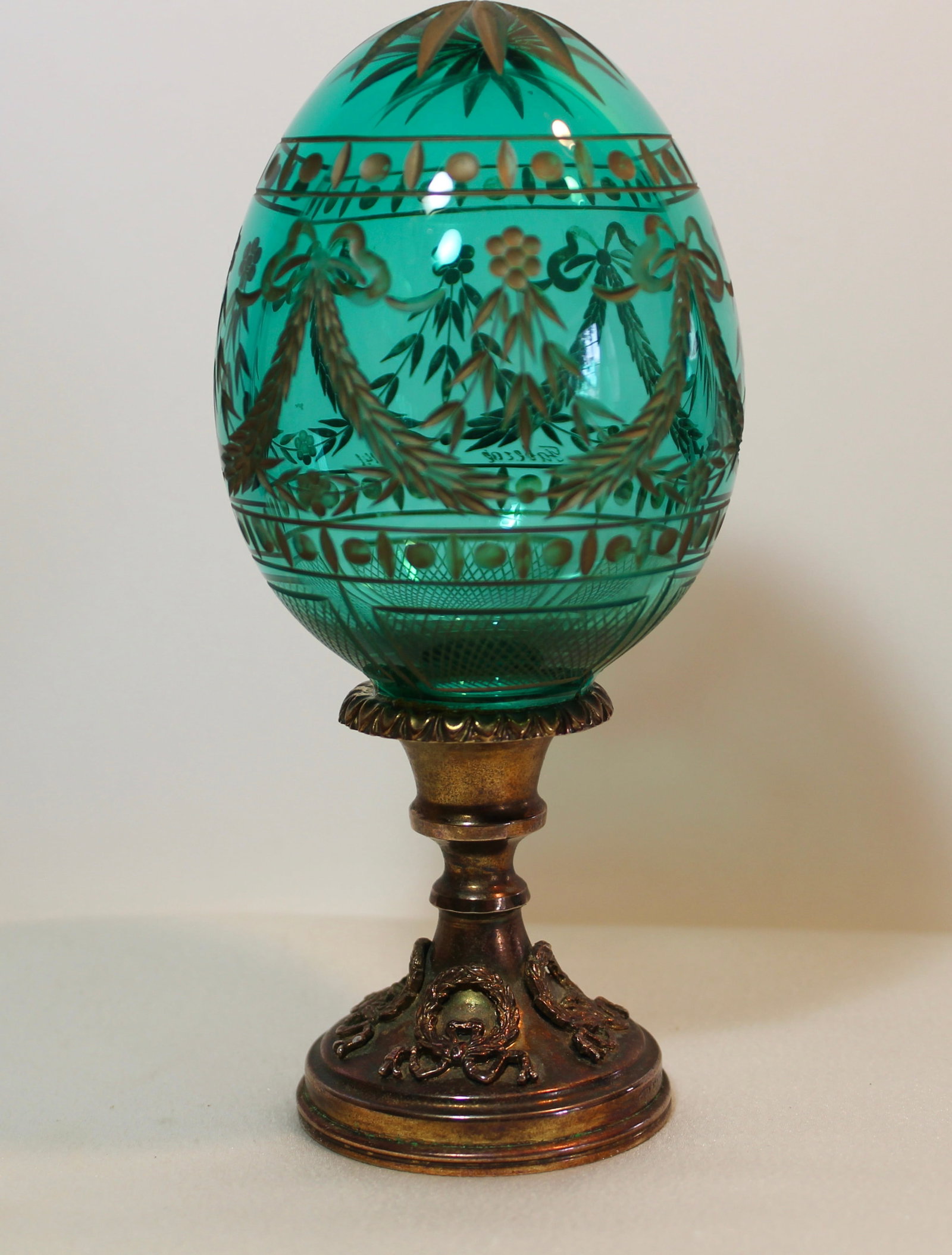 FABERGE STERLING AND GLASS EGG: Faberge signed glass and sterling gold gilt egg. Faberge markings. H 6