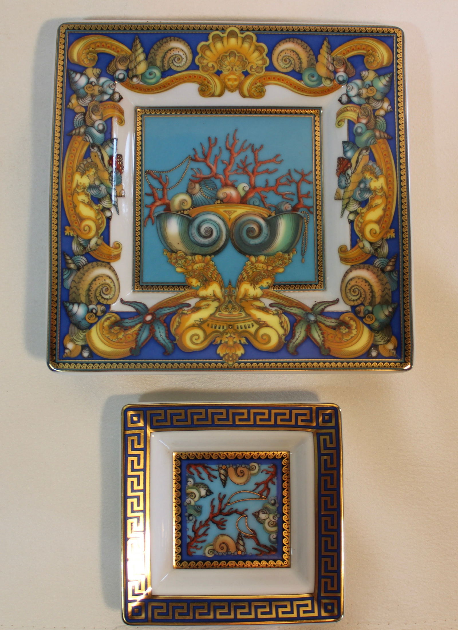 VERSACE TRESORS DE LA MER SQUARE PLATES: Two Versace Tresors De La Mer pattern square plates.