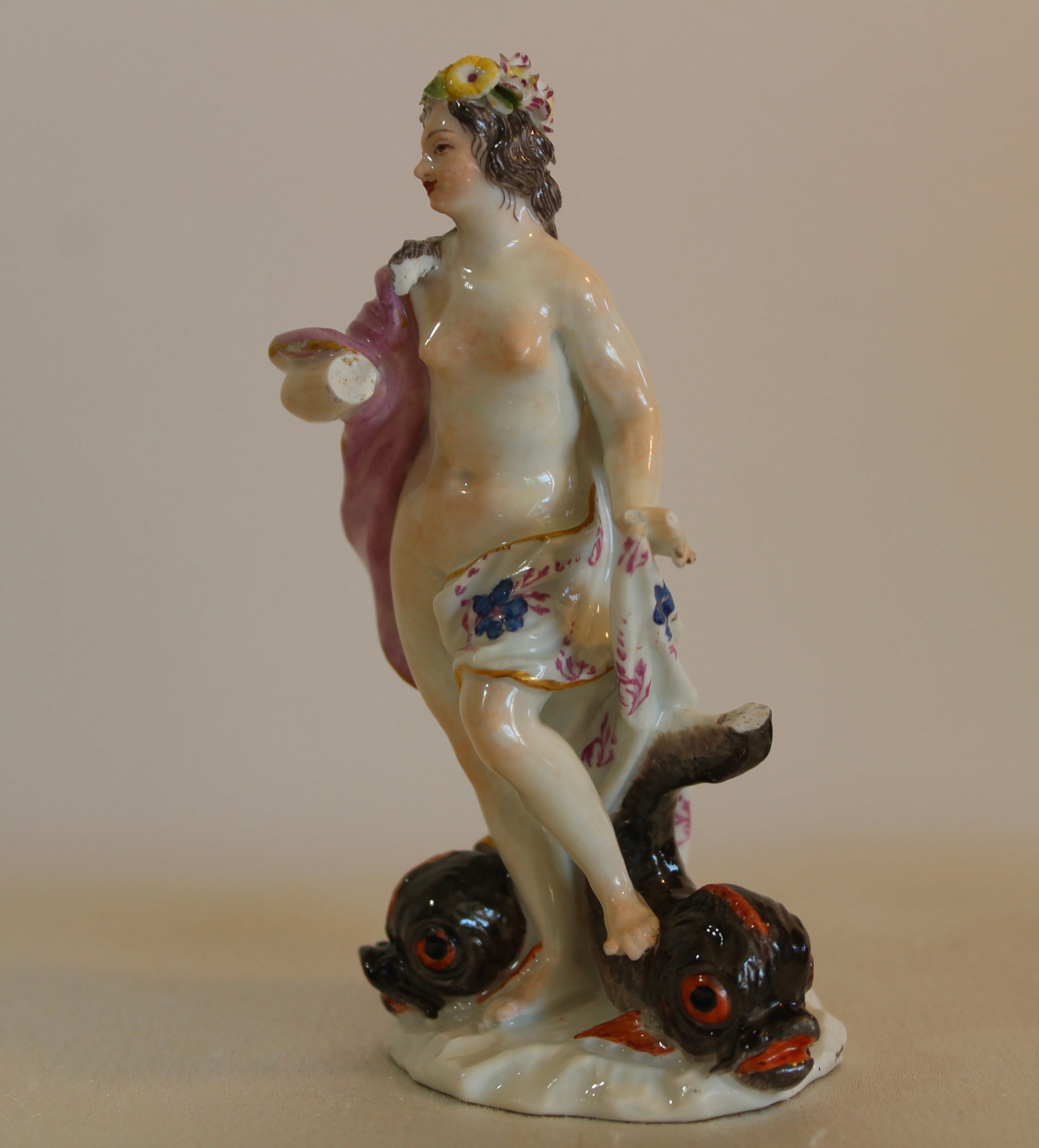 MEISSEN 18TH CENTURY RIVER GODDESS FIGURE: Antique Meissen 18th century figure of a river goddess. As-is condition. H 5 inches.