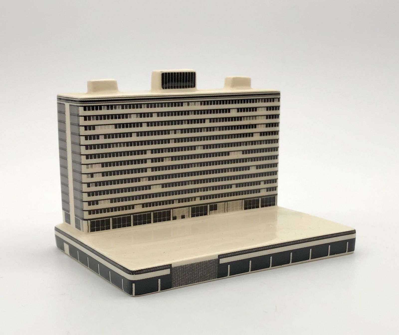 Ceramic Model of Tel Aviv City Hall Building: Ceramic model of Tel Aviv city hall in scale 1:1000. Made by typical local souvenir, of the Israeli American designer Johnathan Hopp. Israel, circa the early 21th century.Base: approximately 10X7 cm,