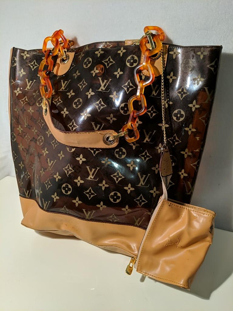 Louis Vuitton Amber Vinyl Tote. Multiple scuffs. Coin: Louis Vuitton Amber Vinyl Tote. Multiple scuffs. Coin purse has stains. Multiple scuffs. Coin purse has stains.