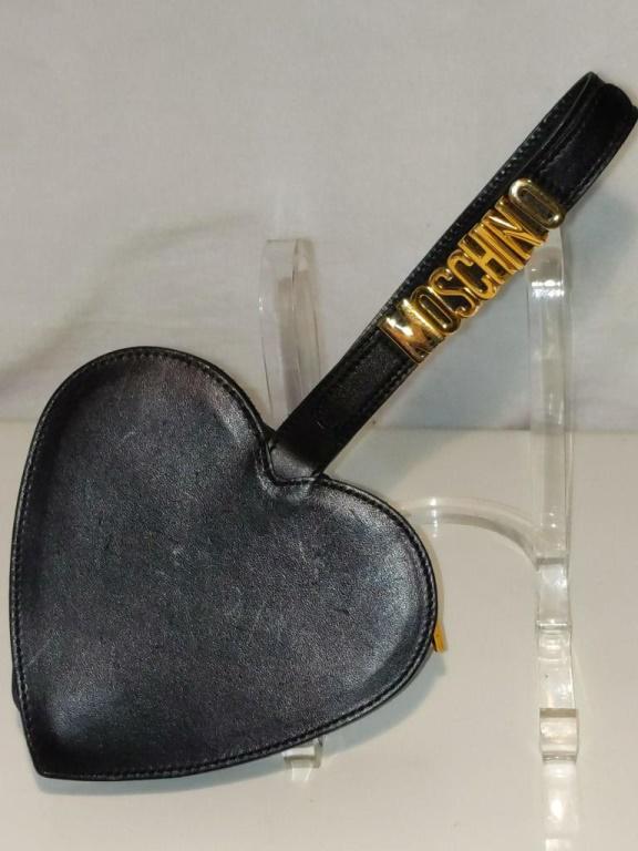 Moschino Heart-Shaped Evening Purse Approx 12" from: Moschino Heart-Shaped Evening Purse Approx 12" from base of heart to top of strap Approx 12" from base of heart to top of strap