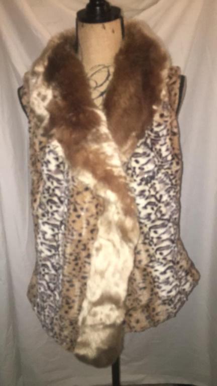 Faux Frenzi by Dena Fur Vest Sz Small Like new.: Faux Frenzi by Dena Fur Vest Sz Small Like new. Polyester & Acrylic. Button needs to be sewn back on. Like new. Polyester & Acrylic. Button needs to be sewn back on.