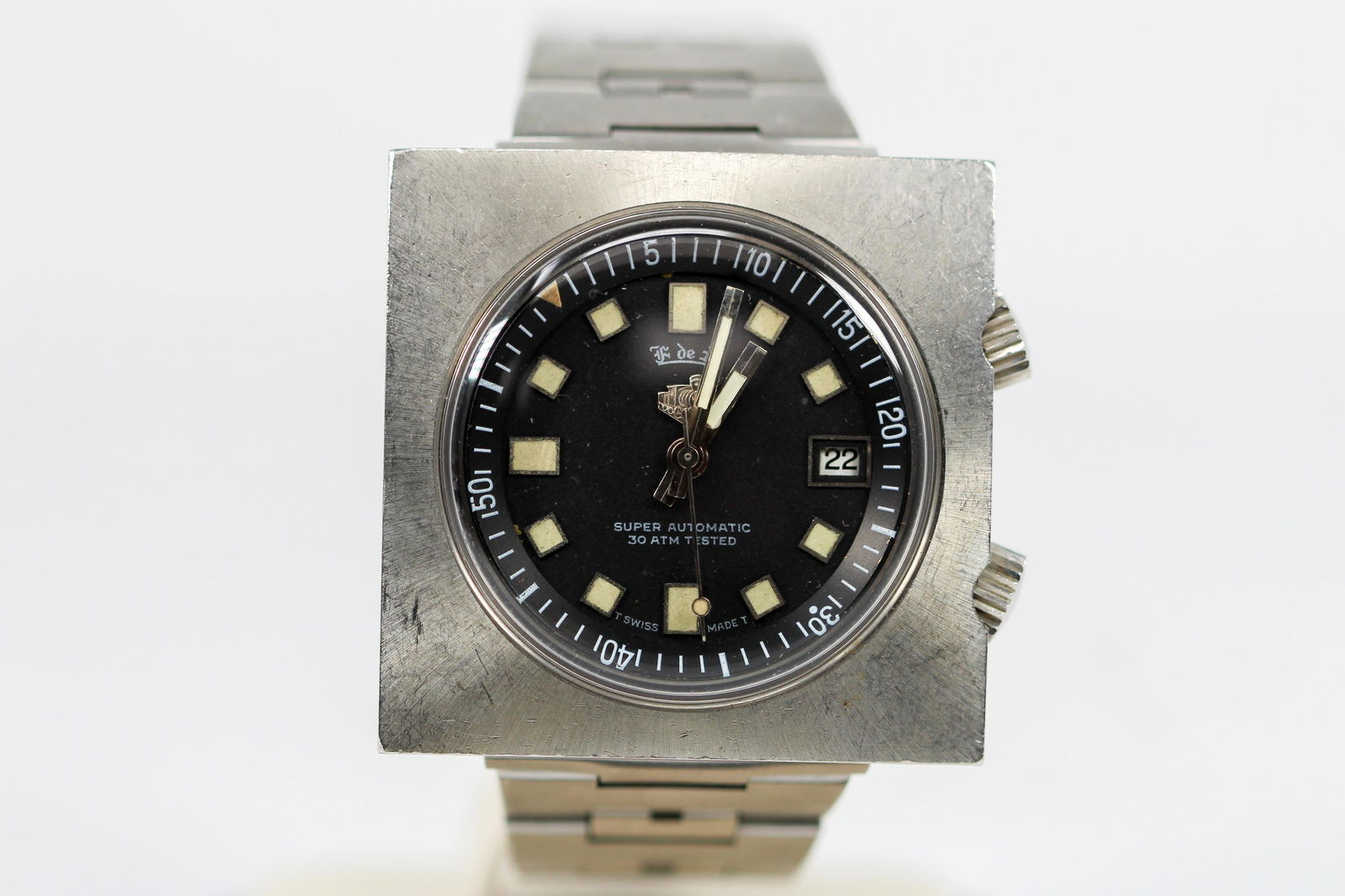 Vintage F de A Super Automatic Square Wristwatch: Stainless Steel Vintage F de A wristwatch. Bracelet signed Mido. 40mm x 40mm diameter. Currently running.