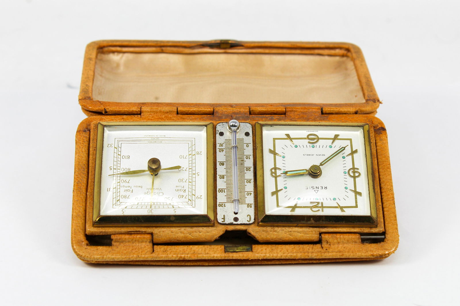 Vintage Rensie travel/purse Alarm Clock with: Vintage Rensie Travel Clock with thermometer and temperature gauge; unable to test prior to cataloging.