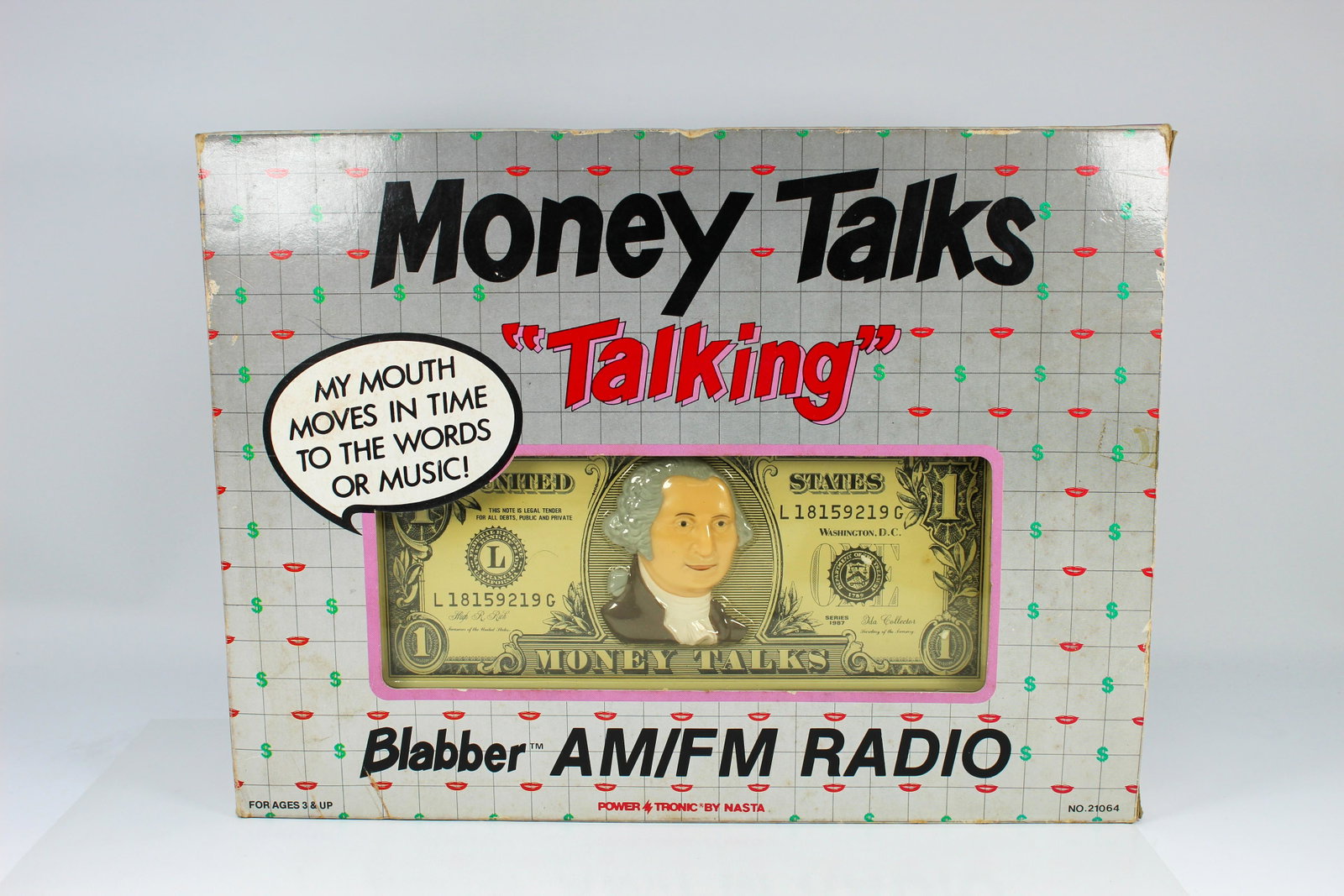 POWER TRONIC "MONEY TALKS" BLABBER AM/FM RADIO (ca.: In original box with original inner packaging. When the volume is turned up the circuit in the audio causes George's mouth to open and his tongue to move.