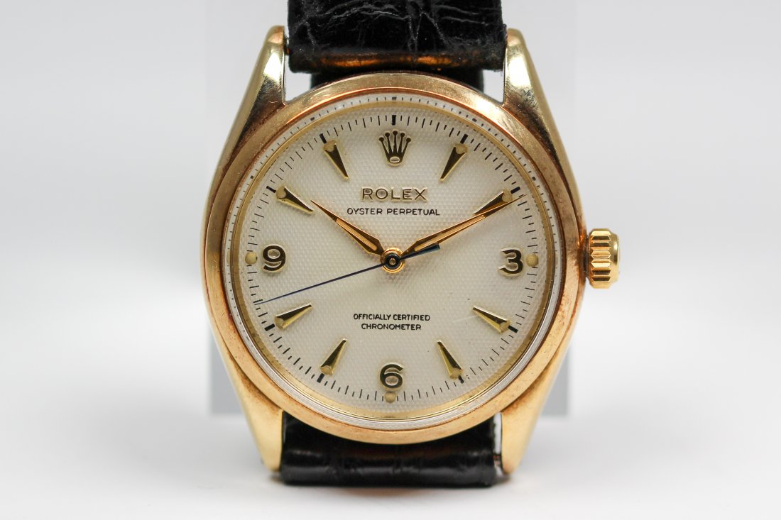 Vintage Rolex Oyster Perpetual Wristwatch in 14k Yellow: 14k Yellow Gold Vintage Rolex Oyster Perpetual Wristwatch. 34mm diameter. Model 6564, Serial 214359. Not Running.