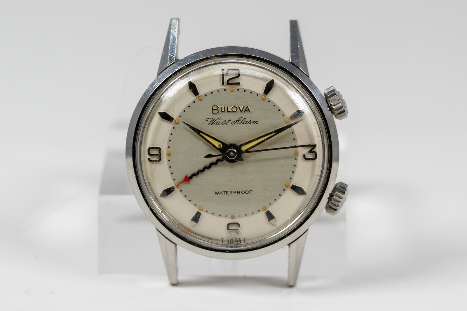 Vintage Bulova Wrist Alarm Wristwatch: Stainless Steel Vintage Bulova Wrist Alarm Wristwatch. 34mm diameter. Running at time of cataloging.
