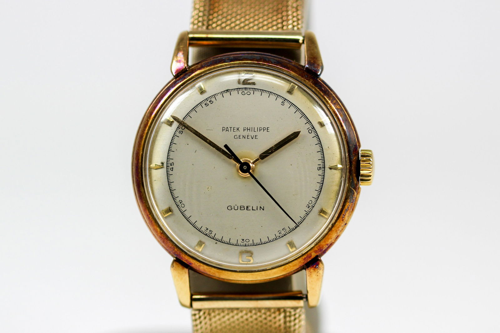 Vintage Patek Philippe Geneve Gubelin Wristwatch in 18k Yellow Gold on 14k Yellow Gold Bracelet (1 of 9)