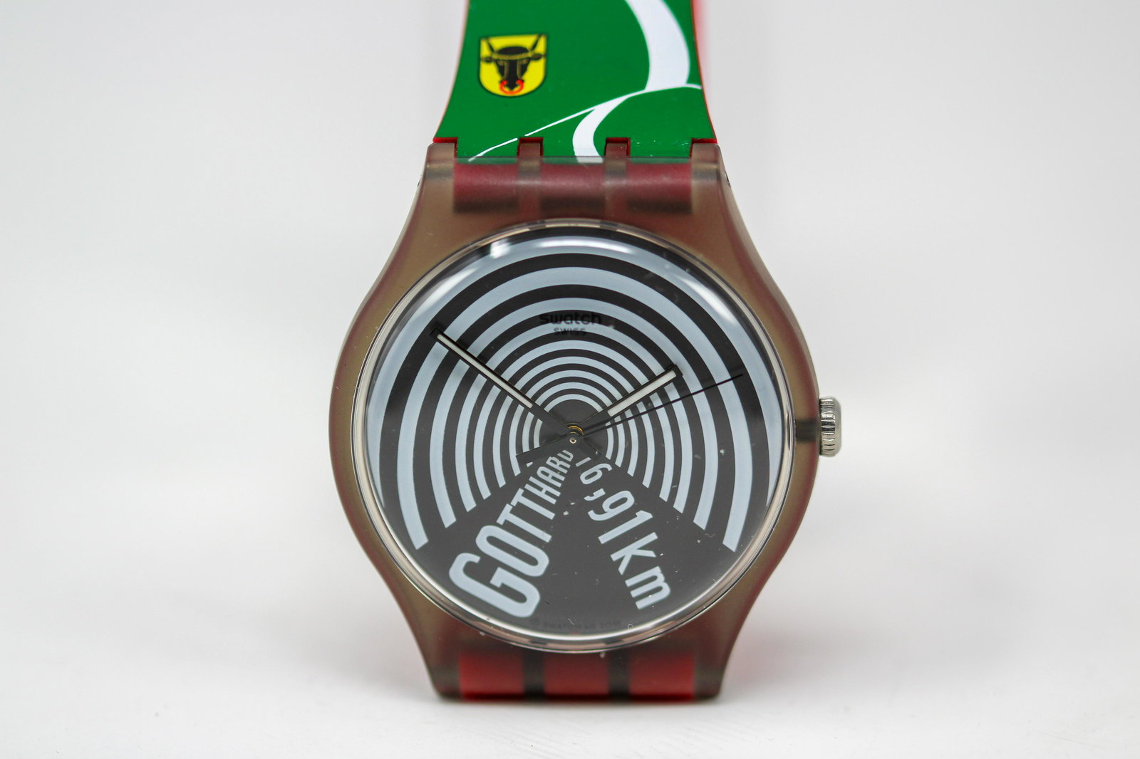 SWATCH "Stau Gotthard Road Tunnel" Wristwatch: SWATCH "Stau Gotthard Road Tunnel" Wristwatch. Special Gotthard, quartz movement. Number 116 from a limited edition of 1691 pieces, illustrated cardboard slipcase ca. 2017. 41mm diameter. Not running 