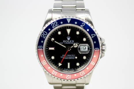 Vintage Rolex Oyster Perpetual Date GMT-Master Wristwatch: Stainless Steel Vintage Rolex Oyster Perpetual Date GMT-Master Wristwatch on Stainless Steel Rolex bracelet; Model 16700, Serial # U722288. 40mm diameter. Running at time of cataloging.