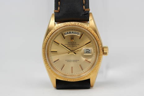 Vintage Rolex Oyster Perpetual Day-Date Wristwatch in 18k Yellow Gold: 18k Yellow Gold Vintage Rolex Oyster Perpetual Day-Date Wristwatch; Model 1807, Serial # 1607416. 36mm diameter. Running at time of cataloging.