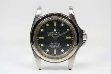 Vintage Rolex Oyster Perpetual Submariner Wristwatch: Stainless Steel Vintage Rolex Oyster Perpetual Submariner Wristwatch **No Bezel**; Model 5512, Serial # 1815624. 40mm diameter. Running at time of cataloging.