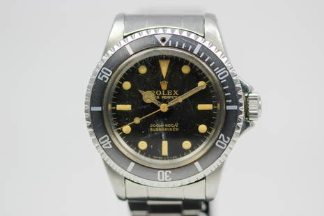 Vintage Rolex Oyster Perpetual Submariner Wristwatch: Stainless Steel Vintage Rolex Oyster Perpetual Submariner Wristwatch on Stainless Steel Rolex bracelet; Model 5513, Serial # 1169708. 40mm diameter. Running at time of cataloging.
