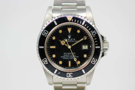 Vintage Rolex Oyster Perpetual Date Sea-Dweller Wristwatch: Stainless Steel Vintage Rolex Oyster Perpetual Date Sea-Dweller Wristwatch on Stainless Steel Rolex bracelet; Model 16660, Serial # 8298693. 40mm diameter. Running at time of cataloging.