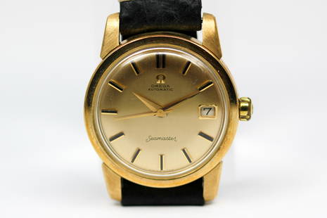 Vintage Omega Seamaster Automatic with Date Wristwatch in 14k Yellow Gold: 14k Yellow Gold Vintage Omega Seamaster Automatic with Date Wristwatch. 34mm diameter. Running at time of cataloging.
