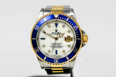 Vintage Two-Tone Rolex Oyster Perpetual Date Submariner Wristwatch with Diamond and Sapphire Dial: Vintage Two-Tone Rolex Oyster Perpetual Date Submariner Wristwatch with Diamond and Sapphire Dial on Two-Tone Rolex bracelet; Model 16613, Serial # S251527. 40mm diameter. Running at time of