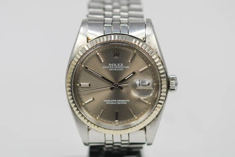 Vintage Rolex Oyster Perpetual Datejust Wristwatch: Stainless Steel Vintage Rolex Oyster Perpetual Datejust Wristwatch on Stainless Steel Rolex bracelet; Model 1601, Serial # 3212410. 36mm diameter. Running at time of cataloging.