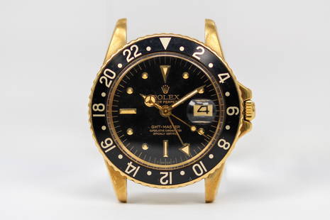 Vintage Rolex Oyster Perpetual GMT-Master with Date Wristwatch in 18k Yellow Gold: 18k Yellow Gold Vintage Rolex Oyster Perpetual GMT-Master with Date Wristwatch; Model 1675, Serial # 3060424. 40mm diameter. Running at time of cataloging.