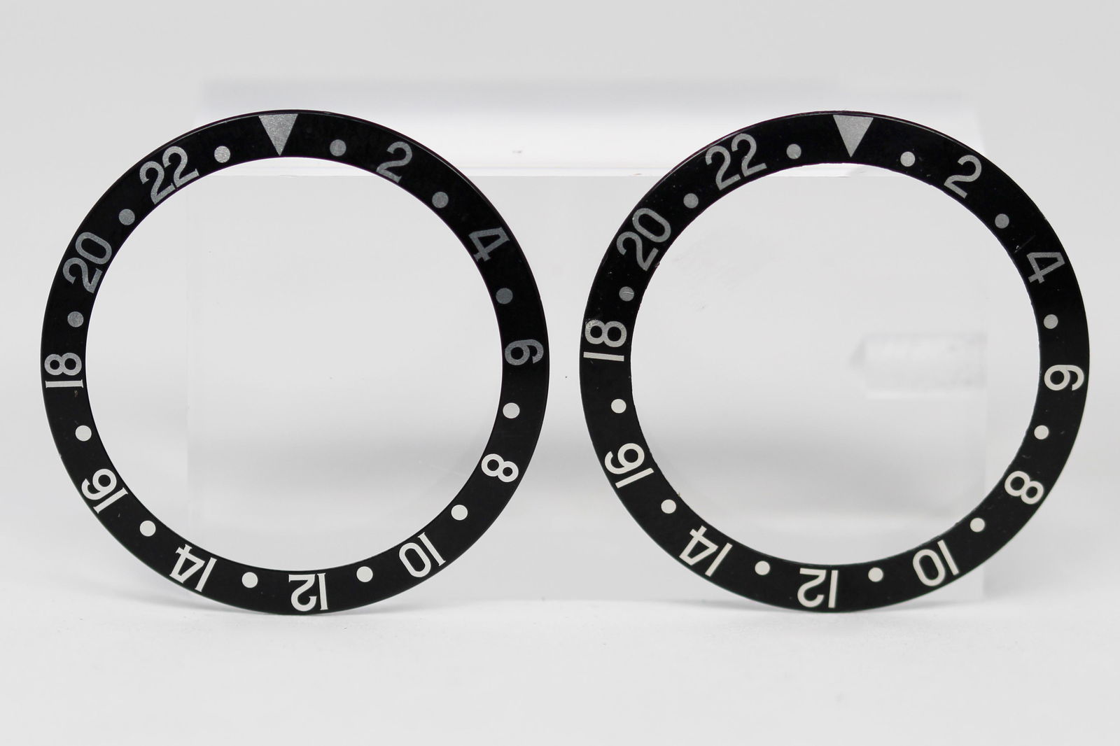 Loose Vintage Rolex GMT Bezels: Loose Vintage Rolex GMT Bezels. Black bezels. 38mm diameter. Loose watch parts.