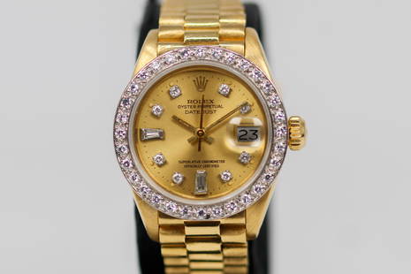 Vintage Ladies Rolex Oyster Perpetual Datejust Wristwatch in 18k Yellow Gold *Diamonds are After: 18k Yellow Gold Vintage Ladies Rolex Oyster Perpetual Datejust Wristwatch on 18k Yellow Gold Rolex bracelet *Diamonds are After Market*; Model 6917, Serial # 6069688. 25mm diameter. Not running.