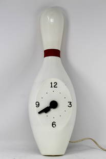 TENPIN NOVELTY CLOCK: Made by Mastercrafters (circa.1950s), a 12" high plastic bowling pin clock, electrically powered, rare, especially with the original box.