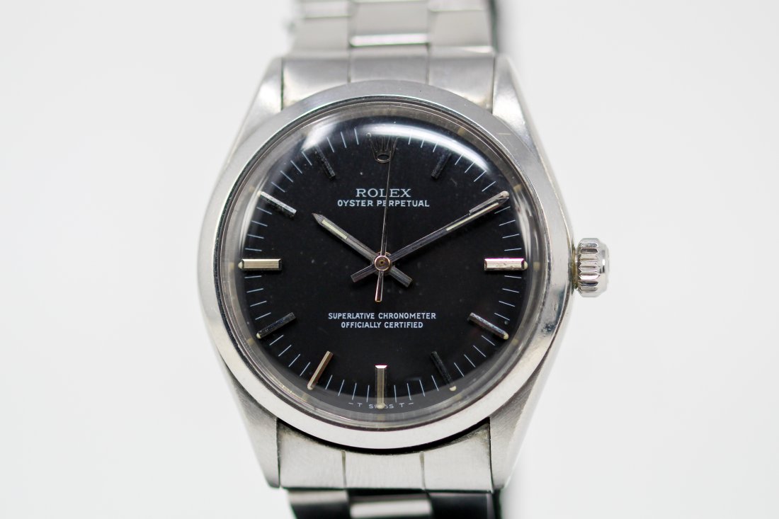 Vintage Rolex Oyster Perpetual Wristwatch: Stainless Steel Vintage Rolex Oyster Perpetual Wristwatch on Stainless Steel Rolex bracelet; Model 5500, Serial # 2777595. 36mm diameter. Running at time of cataloging.