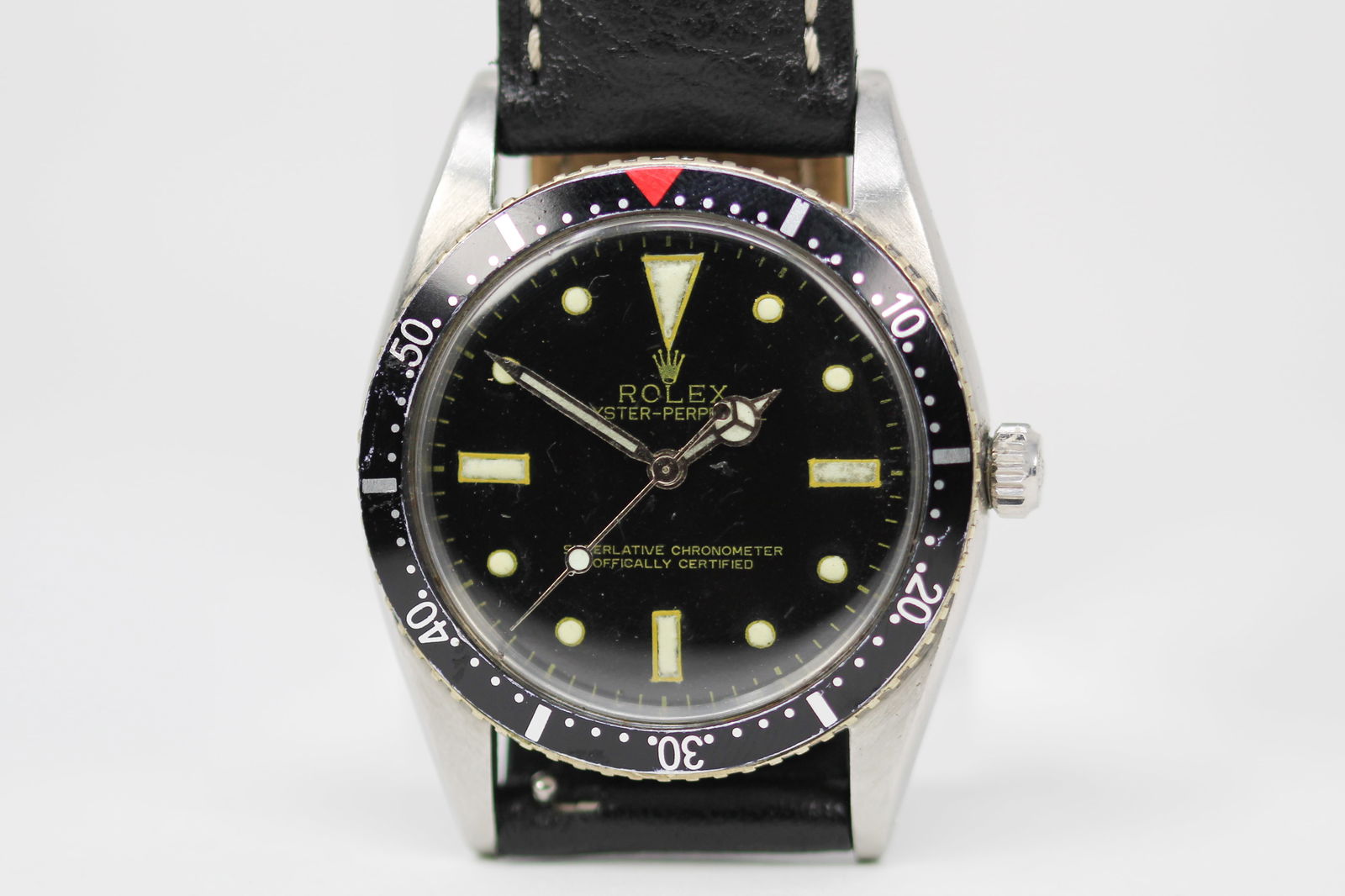 Vintage Rolex Oyster Perpetual Wristwatch: Stainless Steel Vintage Rolex Oyster Perpetual Wristwatch; Model 6202, Serial # 952712. 36mm diameter. Running at time of cataloging.