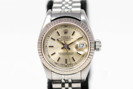 Vintage Ladies Rolex Oyster Perpetual Datejust Wristwatch: Stainless Steel Vintage Ladies Rolex Oyster Perpetual Datejust Wristwatch on Stainless Steel Rolex bracelet; Model 69174, Serial # L571836. 26mm diameter. Running at time of cataloging.