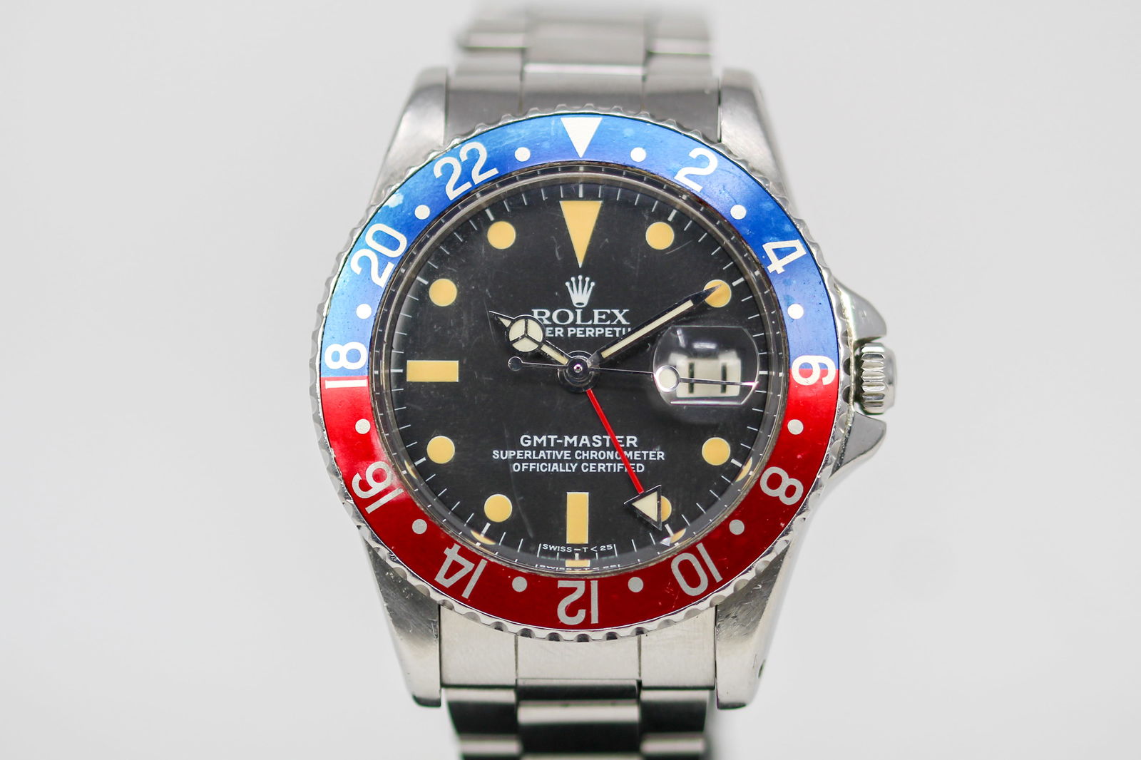 Vintage Rolex Oyster Perpetual GMT-Master with Date Wristwatch: Stainless Steel Vintage Rolex Oyster Perpetual GMT-Master with Date Wristwatch on Stainless Steel Rolex bracelet; Model 1675, Serial # 1506049. 40mm diameter. Running at time of cataloging.