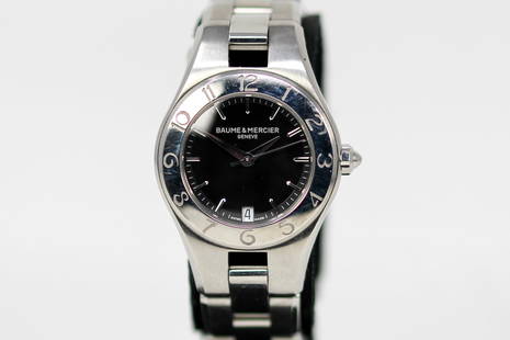 Ladies Baume & Mercier Geneve Linea with Date Wristwatch: Stainless Steel Ladies Baume & Mercier Geneve Linea with Date Wristwatch on Stainless Steel Baume & Mercier bracelet; Serial # 5110523. 27mm diameter. Not running.