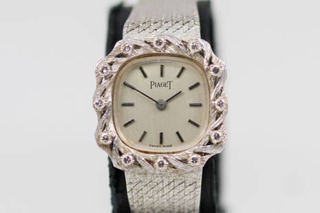 Vintage Ladies Piaget Wristwatch in 18k White Gold: 18k White Gold Vintage Ladies Piaget Wristwatch on 18k White Gold Piaget bracelet; Serial # 2614013. 22mm diameter. Running at time of cataloging.