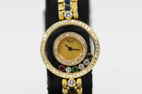 Ladies Chopard Geneve Happy Diamonds Saphire & Diamond Wristwatch in 18k Yellow Gold: 18k Yellow Gold Ladies Chopard Geneve Happy Diamonds Saphire & Diamond Wristwatch; 265385 4097. 23mm diameter. Not running.