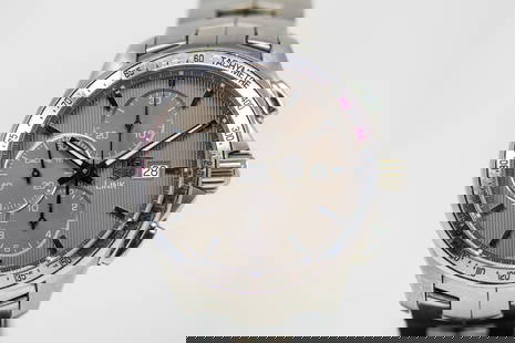 Tag Heuer Link Chronograph with Date Wristwatch: Stainless Steel Tag Heuer Link Chronograph with Date Wristwatch on Stainless Steel Tag Heuer bracelet; Model CAT 2013, Serial # EPX1121. 44mm diameter. Not running.