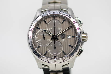 Tag Heuer Link Chronograph with Date Wristwatch: Stainless Steel Tag Heuer Link Chronograph with Date Wristwatch on Stainless Steel Tag Heuer bracelet; Model CAT 2013, Serial # EPX1121. 44mm diameter. Not running.