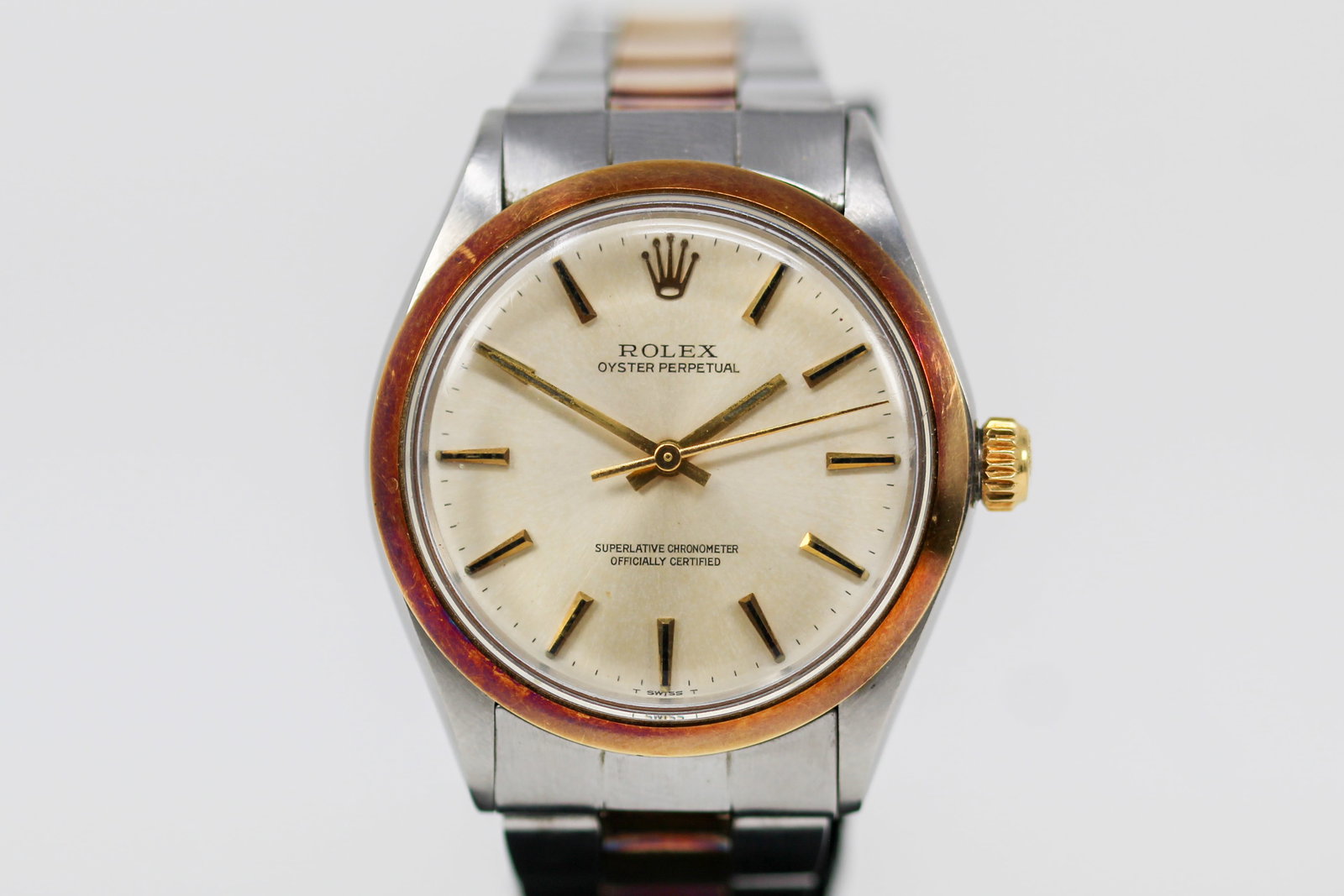 Two-Tone Vintage Rolex Oyster Perpetual Wristwatch with Rolex Certificate: Two-Tone Vintage Rolex Oyster Perpetual Wristwatch on Two-Tone Rolex bracelet with Rolex Certificate; Model 1002, Serial # 3570889. 34mm diameter. Running at time of cataloging.