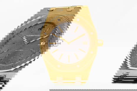 Audemars Piguet Royal Oak Automatic with Date Wristwatch in 18k Yellow Gold: 18k Yellow Gold Audemars Piguet Royal Oak Automatic with Date Wristwatch; Model 5402, Serial # 349. 39mm diameter. Running at time of cataloging.