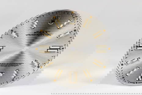 Loose Rolex Oyster Perpetual Dial *Retired Watcmaker's Collection*: Loose Rolex Oyster Perpetual Dial *Retired Watcmaker's Collection*. Silver dial. 32mm diameter. Loose watch parts.