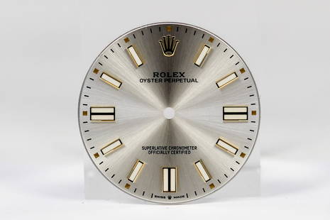 Loose Rolex Oyster Perpetual Dial *Retired Watcmaker's Collection*: Loose Rolex Oyster Perpetual Dial *Retired Watcmaker's Collection*. Silver dial. 32mm diameter. Loose watch parts.