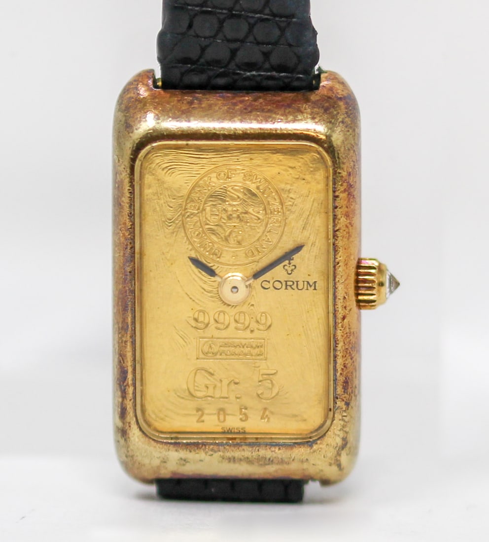 Vintage Ladies Corum Recangular Dress Wristwatch in 18k Yellow Gold: 18k Yellow Gold Vintage Ladies Corum Recangular Dress Wristwatch with Corum Buckle; Ref 14300, Serial # 346106. 17mm x 28mm. Running at time of cataloging. As clearly spelled out in our Auction Terms: