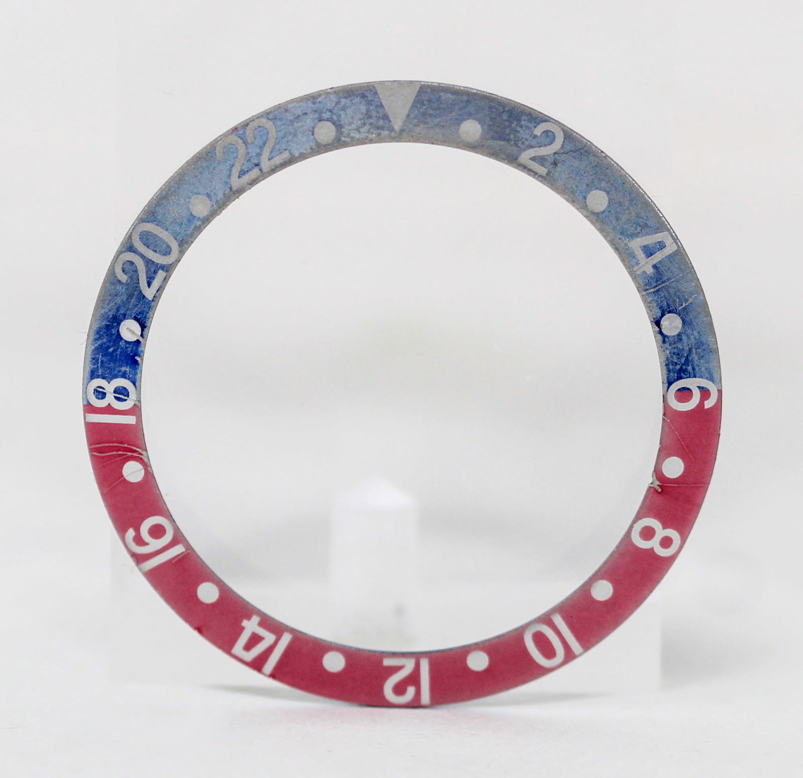 Loose Vintage Rolex GMT Bezel: Loose Vintage Rolex GMT Bezel. Red and blue bezel. 37mm diameter. Loose watch parts. PLEASE NOTE: all wristwatches are sold "as-is", with no mechanical warranty or guarantee. Any representation as to