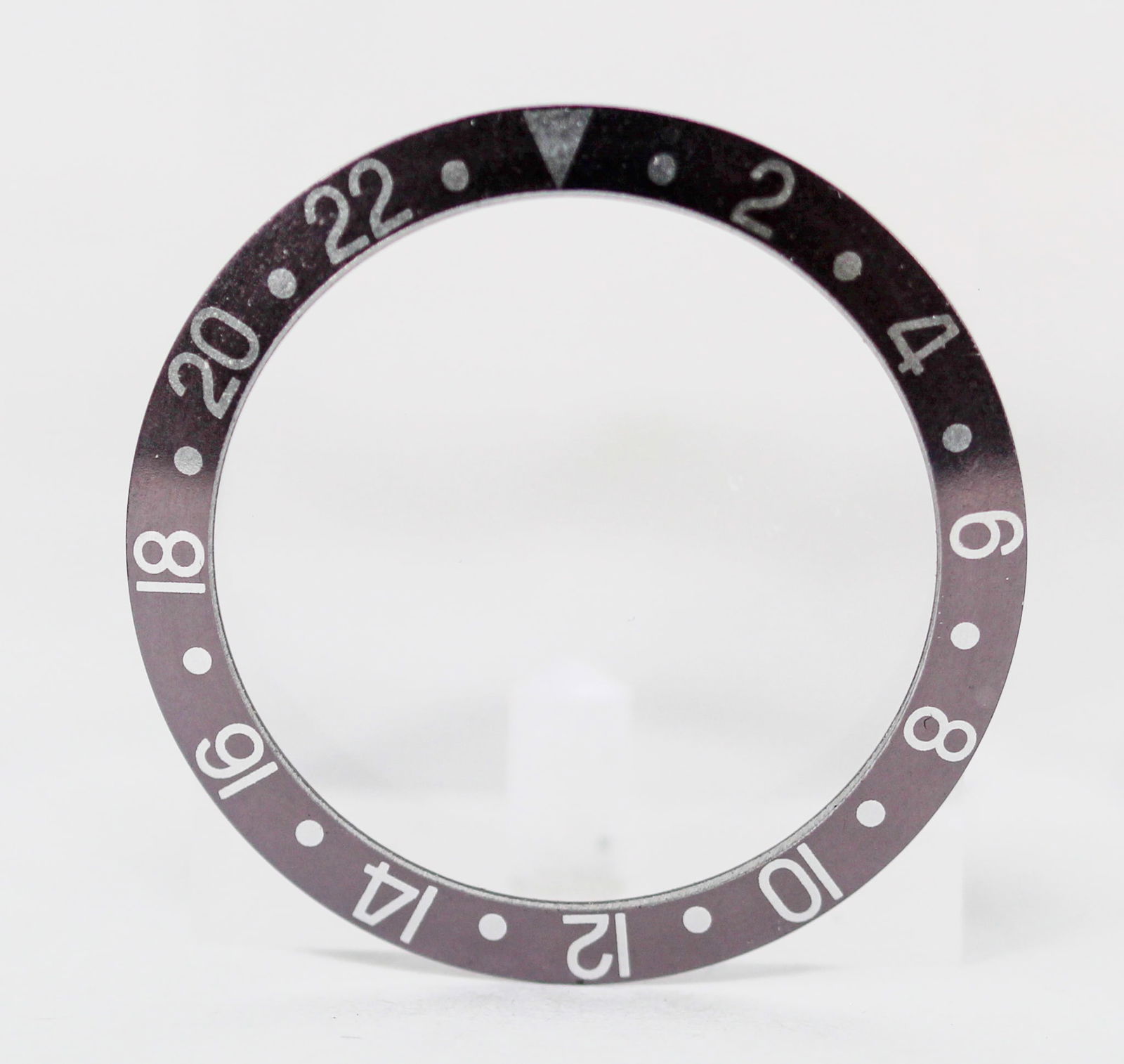 Loose Vintage Rolex GMT Bezel: Loose Vintage Rolex GMT Bezel. Black bezel. 38mm diameter. Loose watch parts. PLEASE NOTE: all wristwatches are sold "as-is", with no mechanical warranty or guarantee. Any representation as to functio