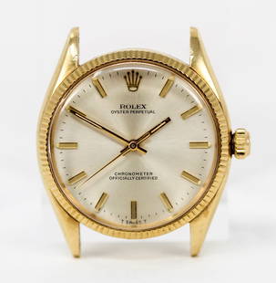 Vintage Rolex Oyster Perpetual Wristwatch in 18k Yellow Gold: 18k Yellow Gold Vintage Rolex Oyster Perpetual Wristwatch; Model 6567, Serial # 261338. 34mm diameter. Running at time of cataloging. PLEASE NOTE: all wristwatches are sold "as-is", with no