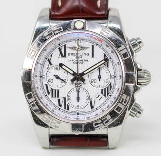 Breitling 1884 Chronomtre Automatic Chronograph with Date Wristwatch: Stainless Steel Breitling 1884 Chronomtre Automatic Chronograph with Date Wristwatch on Breitling Leather Strap; Ref AB0110, Serial # 3010226. 44mm diameter. Running at time of cataloging. PLEASE