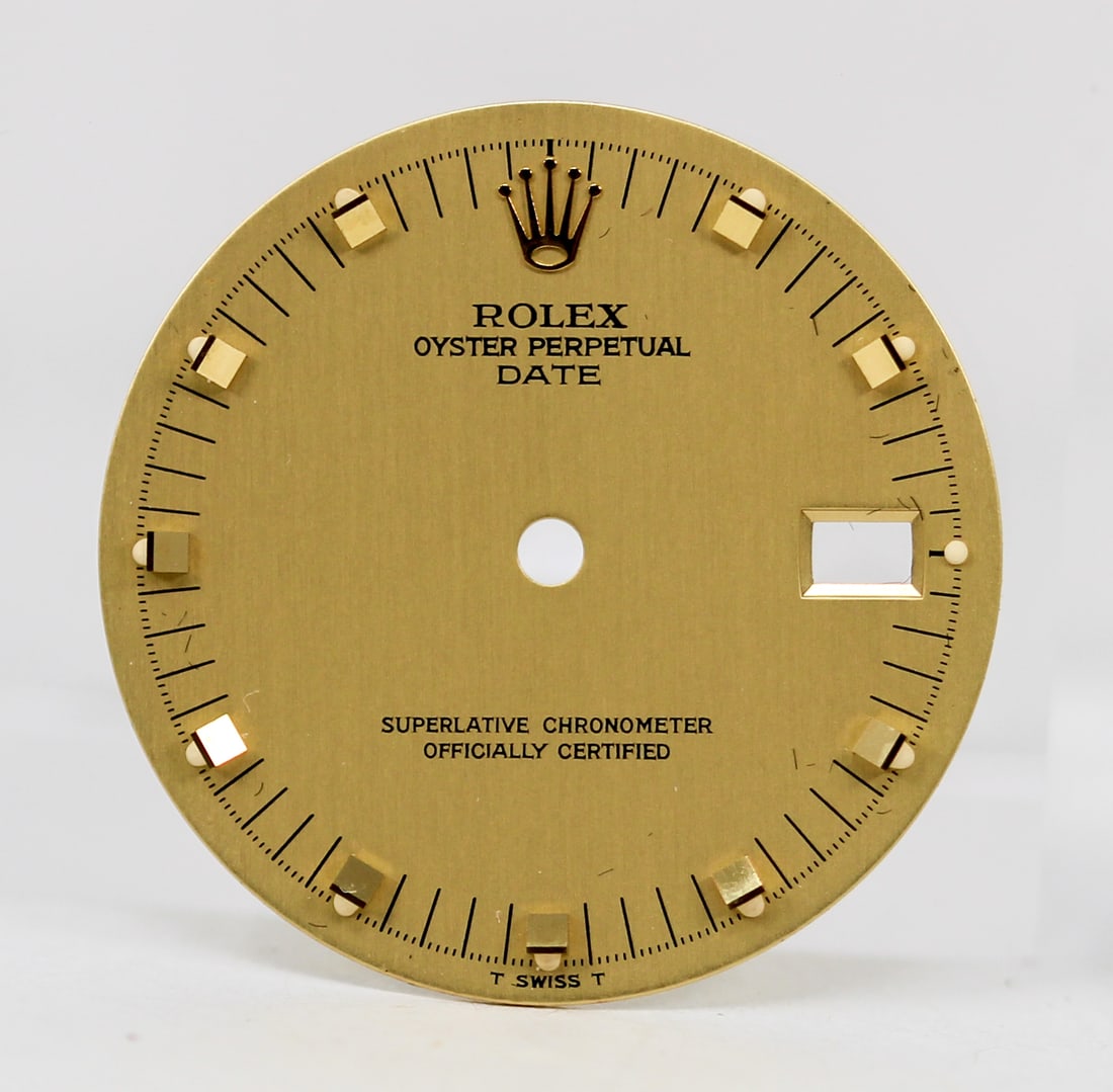 Loose Vintage Rolex Oyster Perpetual Date Dial: Loose Vintage Rolex Oyster Perpetual Date Dial. Gold dial. 27mm diameter. Loose watch parts. PLEASE NOTE: all wristwatches are sold "as-is", with no mechanical warranty or guarantee. Any representatio