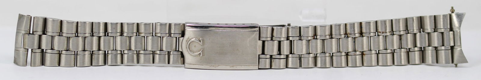 Loose Stainless Steel Omega Bracelet: Loose Stainless Steel Omega Bracelet; 31/1089/526. 6.5" length. Loose watch parts. PLEASE NOTE: all wristwatches are sold "as-is", with no mechanical warranty or guarantee. Any representation as to fu