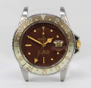 Vintage Rolex Oyster Perpetual GMT-Master with Date Wristwatch *Mismatched Crown; Crown Not: Stainless Steel Vintage Rolex Oyster Perpetual GMT-Master with Date Wristwatch *Mismatched Crown; Crown Not Attached, Needs Repair*; Model 1675, Serial # 1429907. 40mm diameter. Not running. PLEASE NO