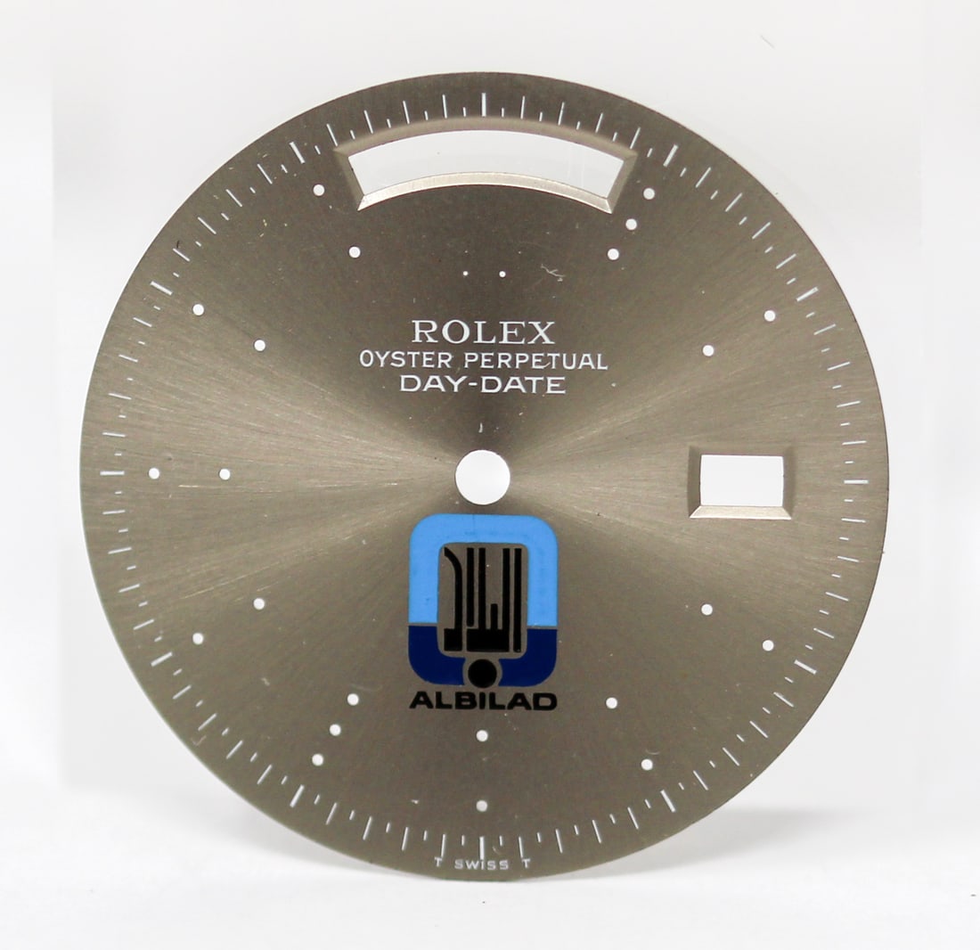 Loose Vintage Rolex Oyster Perpetual Day-Date "Albilad" Dial *Hour Markers Missing*: Loose Vintage Rolex Oyster Perpetual Day-Date "Albilad" Dial *Hour Markers Missing*. Silver dial. 29mm diameter. Loose watch parts. PLEASE NOTE: all wristwatches are sold "as-is", with no mechanical w