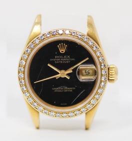 Vintage Ladies Rolex Oyster Perpetual Datejust Wristwatch in 18k Yellow Gold with Factory Rolex Onyx